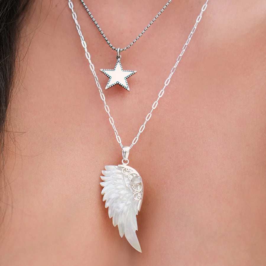 ANGEL ROCKS HAND CARVED WING NECKLACE SILVER available at 1Love2Hugs3Kisses ibiza 