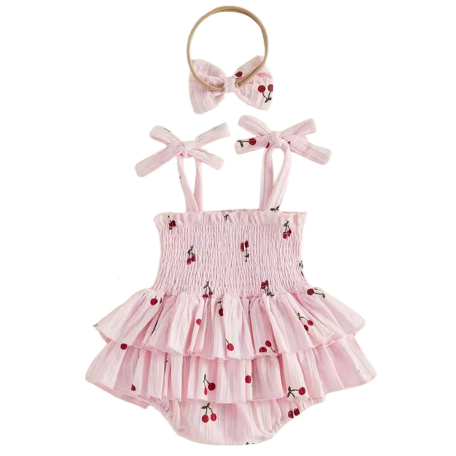 Baby Girl Cherry Smocked Romper Dress with Bow – Pink available at 1love2hugs3kisses ibiza