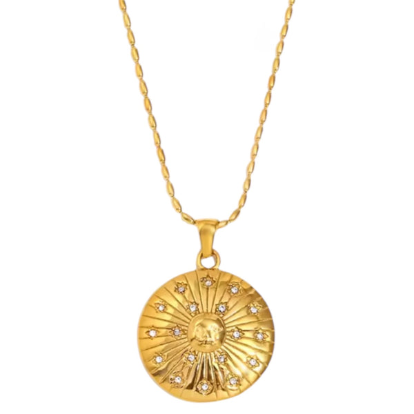 Gold sunburst pendant necklace with rhinestone four-pointed star on stainless steel chain