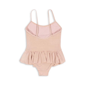 Konges Sløjd Jade Swimsuit Evening Sand – elegant girls swimsuit with frill details, available at 1Love 2Hugs 3Kisses Ibiza.