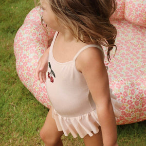 Konges Sløjd Jade Swimsuit Evening Sand – elegant girls swimsuit with frill details, available at 1Love 2Hugs 3Kisses Ibiza.