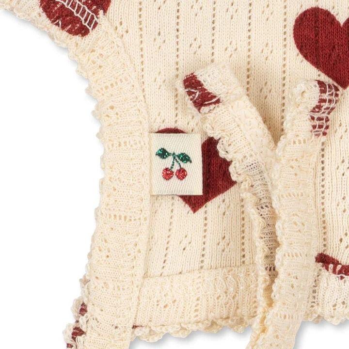 Organic cotton baby bonnet by Konges Sløjd with Amour Rouge print and pointelle pattern from 1love2hugs3kisses Ibiza