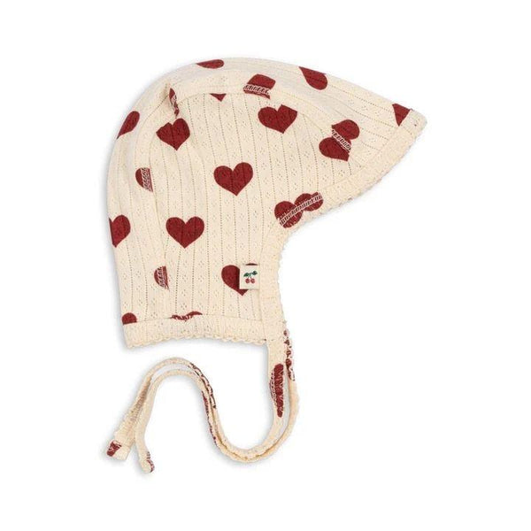 Organic cotton baby bonnet by Konges Sløjd with Amour Rouge print and pointelle pattern from 1love2hugs3kisses Ibiza