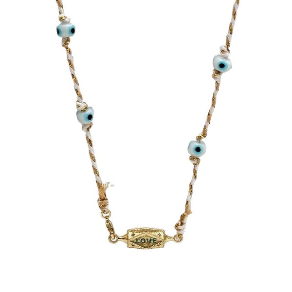 Love Locket Necklace Beige with eyes available at 1Love2Hugs3Kisses Ibiza