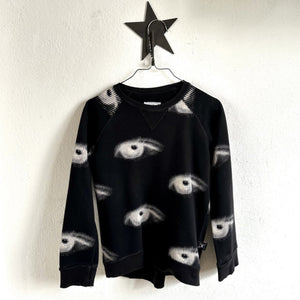 Pre-loved Nununu Black eyes Sweater size 6-7 years